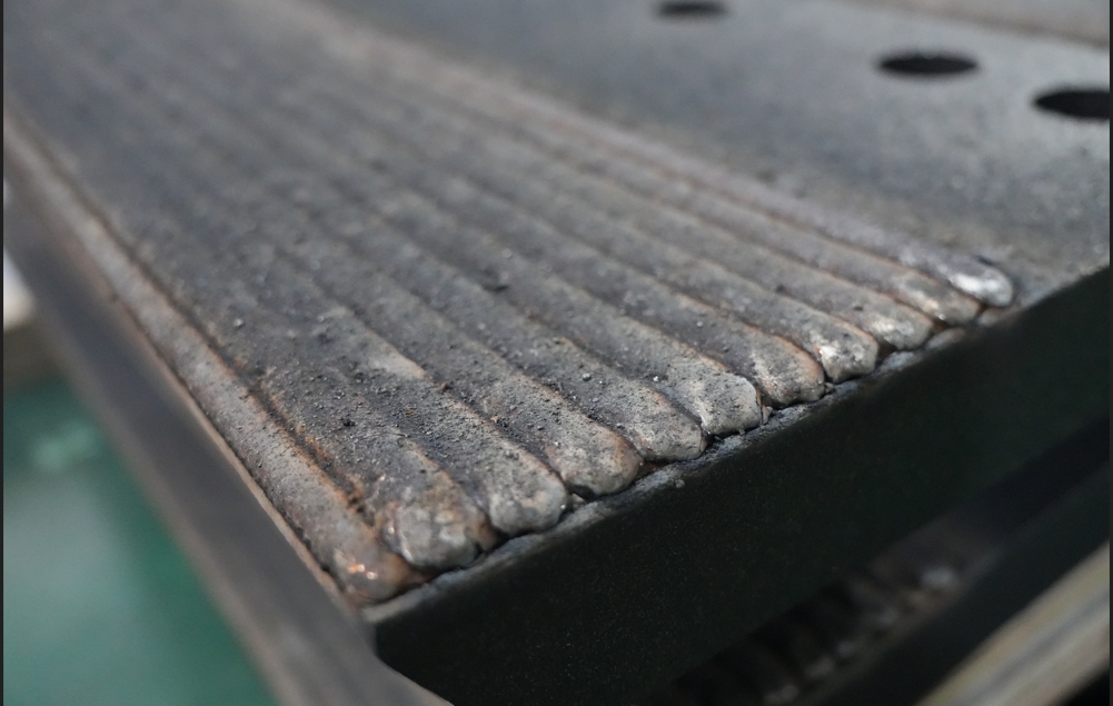 Blade with hardfacing and brazing